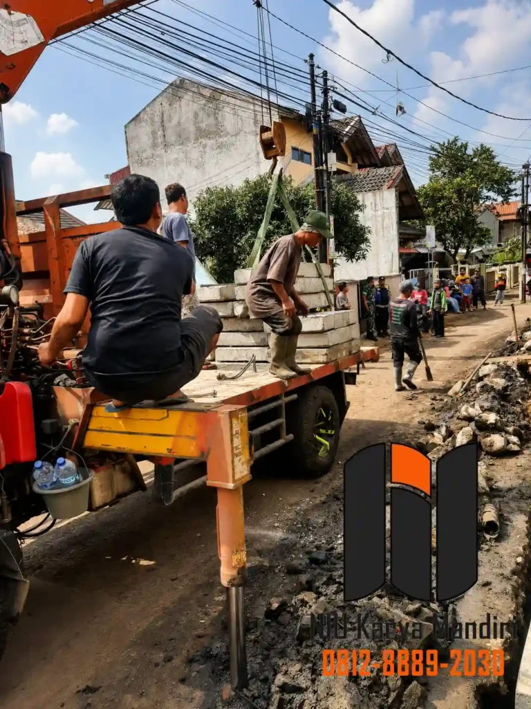 Pengangkatan Beton di Jalan Perumahan